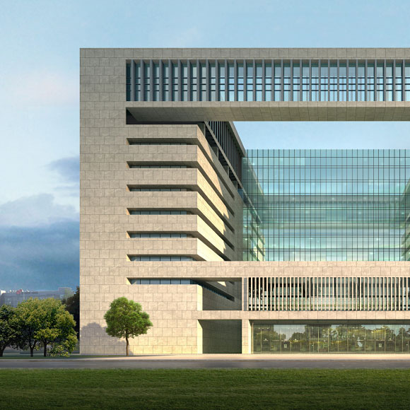 Front elevation of a large, modern block-style building with a massive central open void and inner glass walls.